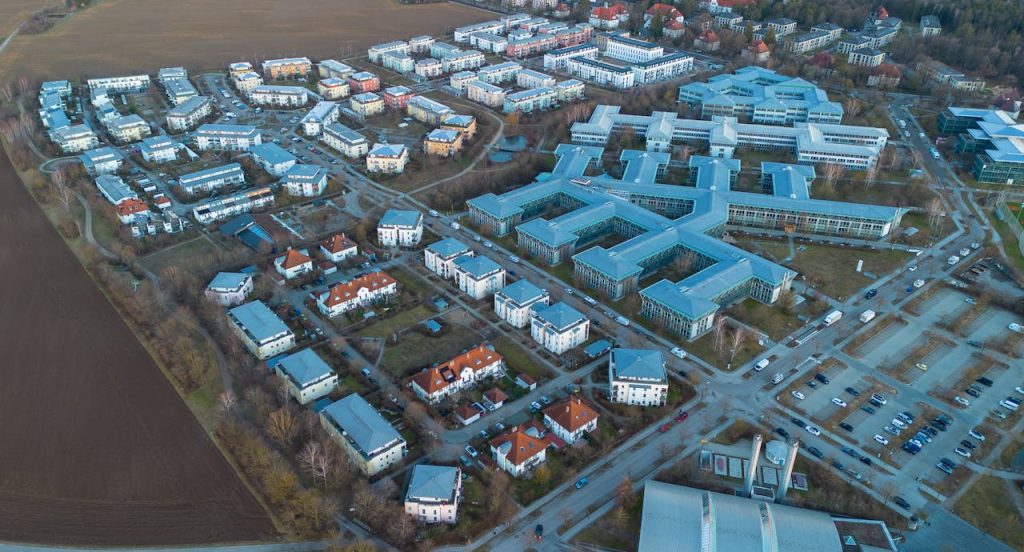 Aerial shot of contemporary urban area in Munich, showcasing architecture and layout.